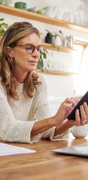 Hobbs Heating and Air customer reviewing flexible HVAC financing options at home