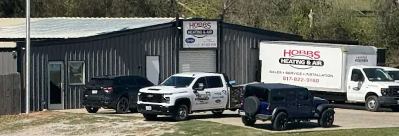 Hobbs Heating and Air shop and service vehicles in Azle, TX