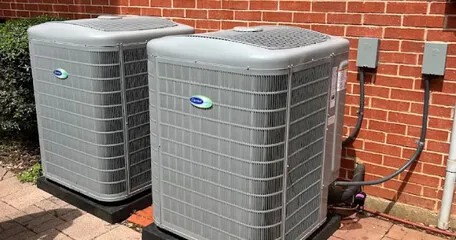New AC condenser unit positioned on a level pad by Hobbs Heating and Air, LLC in Fort Worth, TX